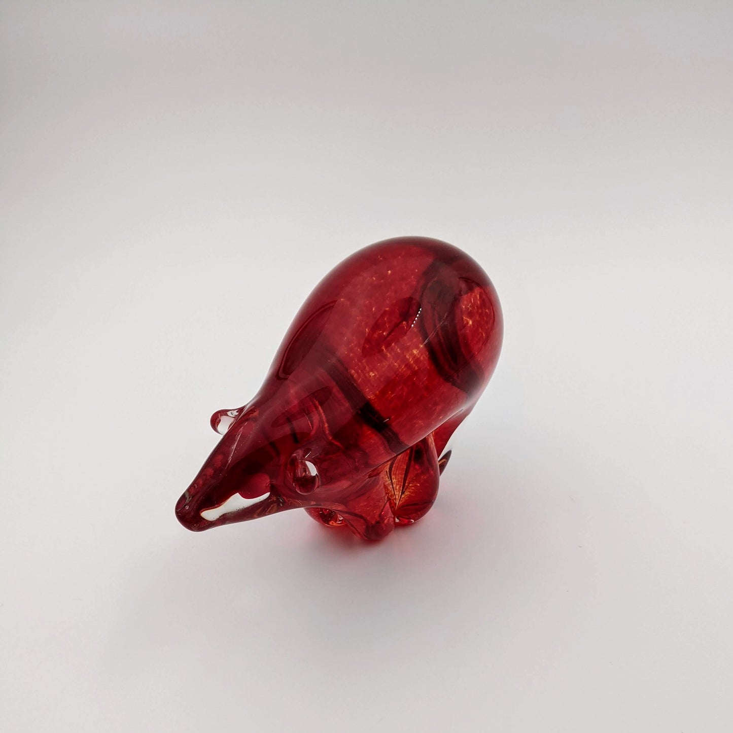 Red Bear with Head Down