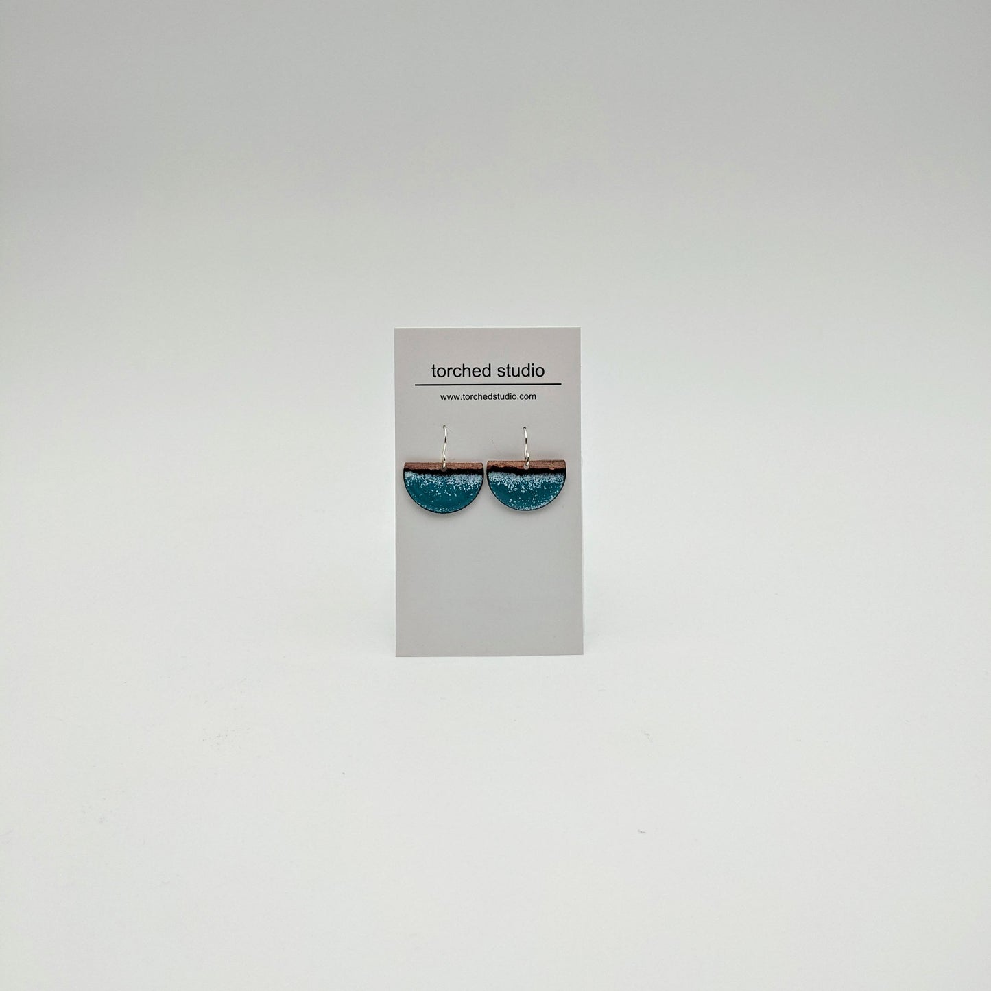 Enamel crescent earrings