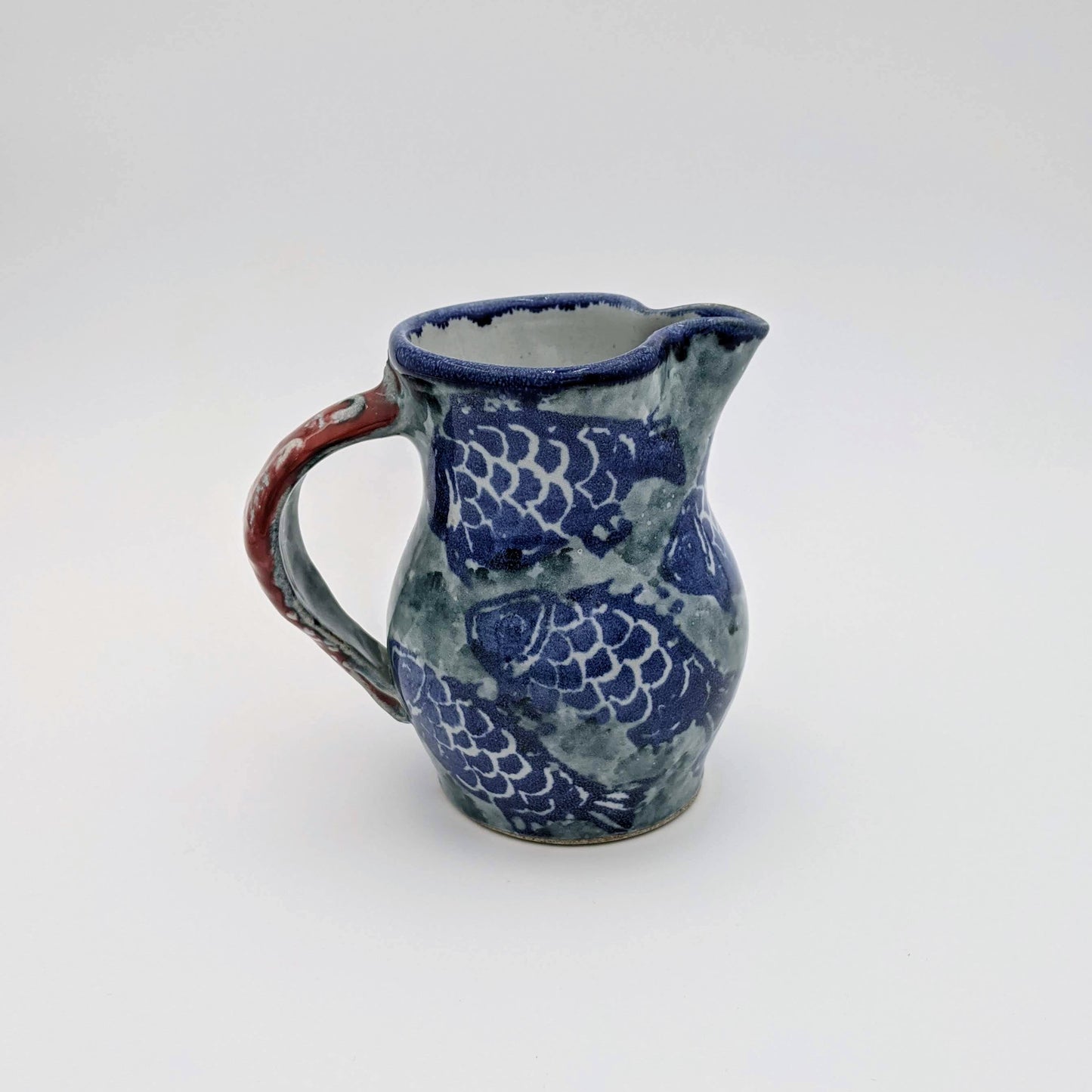 Small Pitcher Fish Motif