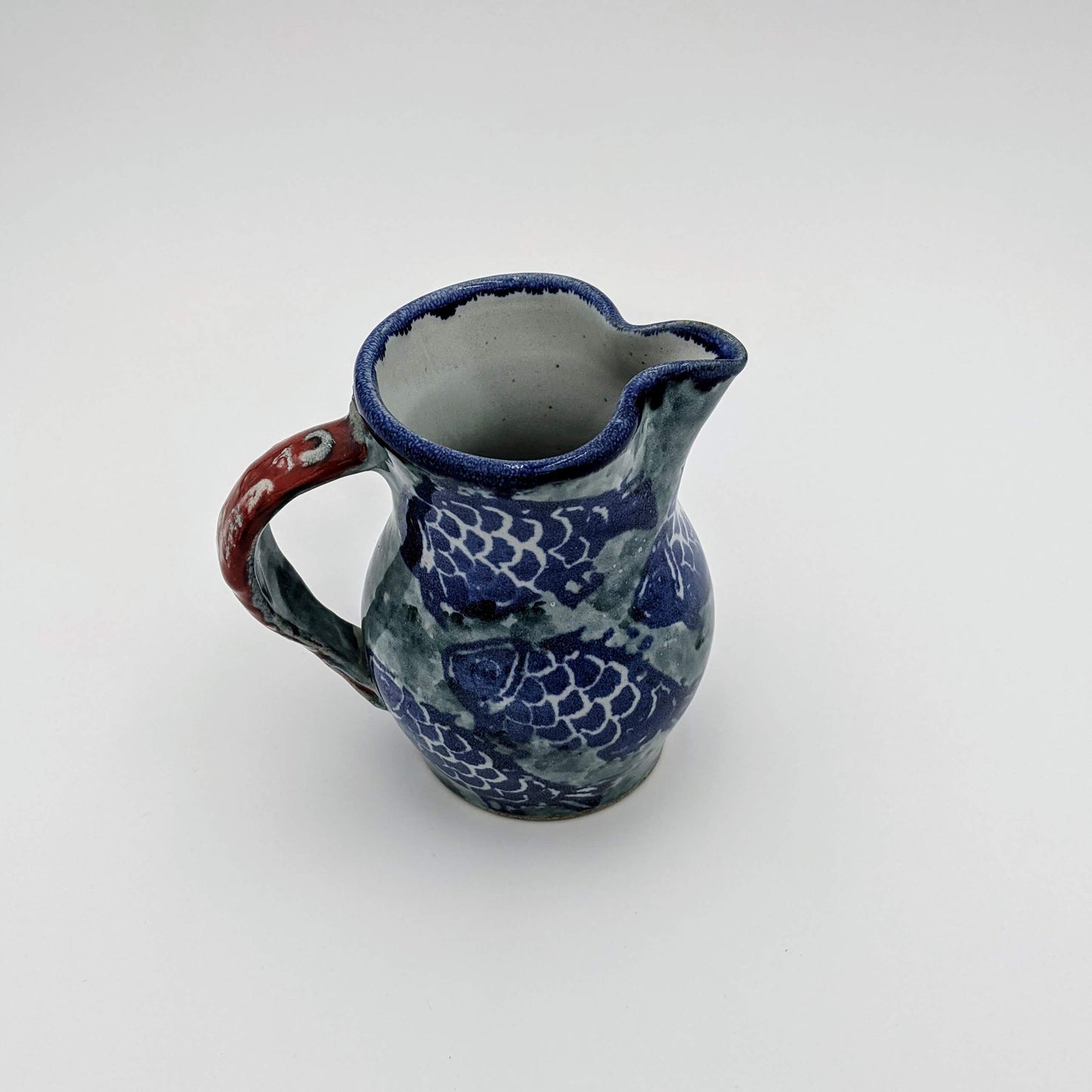 Small Pitcher Fish Motif